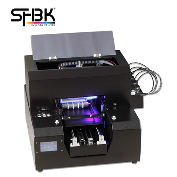 De inyección de tinta 4A UV impresora viene con un dispositivo de rotación, además de un conjunto de tintas para multi-función de los propósitos y el envío gratis